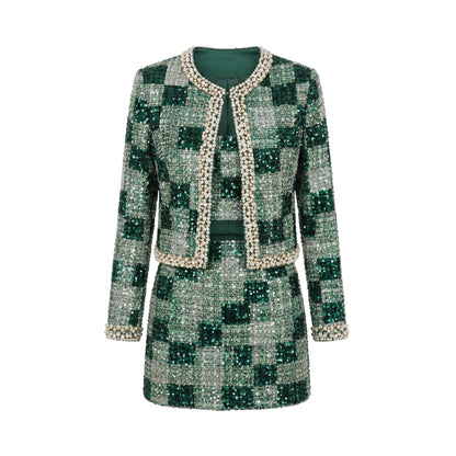 Women's three-piece set: short jacket, short skirt, and a piece of fabric embroidered with heavy sequins.