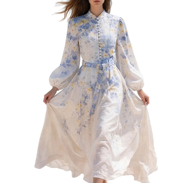 A dress with a belt, adorned with a distinctive watercolor print.